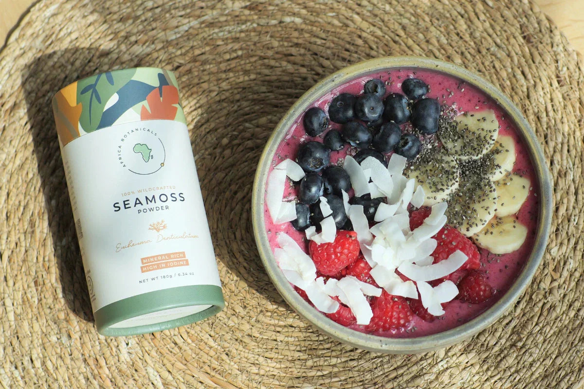 A vibrant breakfast smoothie bowl topped with fresh berries, sliced fruits, and sea moss—colorful, mineral-rich, and packed with natural energy.