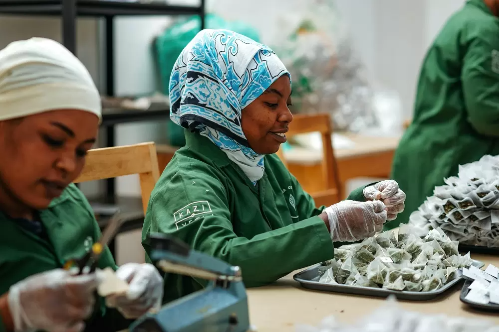 Kazi Yetu factory worker producing tea bags