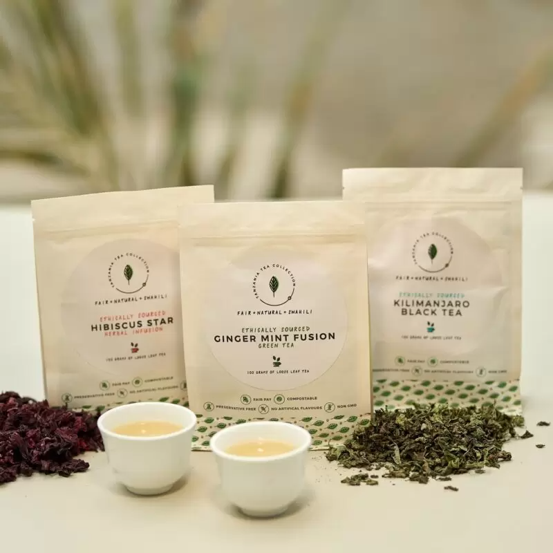 Product picture of refreshing Kazi Yetu summer tea bundle consisting of: 100g Hibiscus Star tea, 100g Ginger Mint Fusion tea, 100g Kilimanjaro Black tea