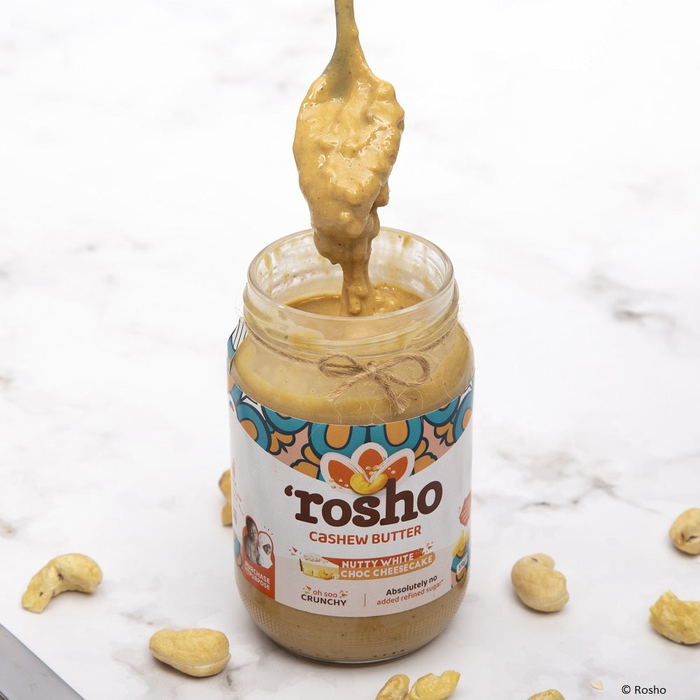 Delicious Tanzanian Rosho Nutty White Choc Cheesecake cashew butter on a spoon